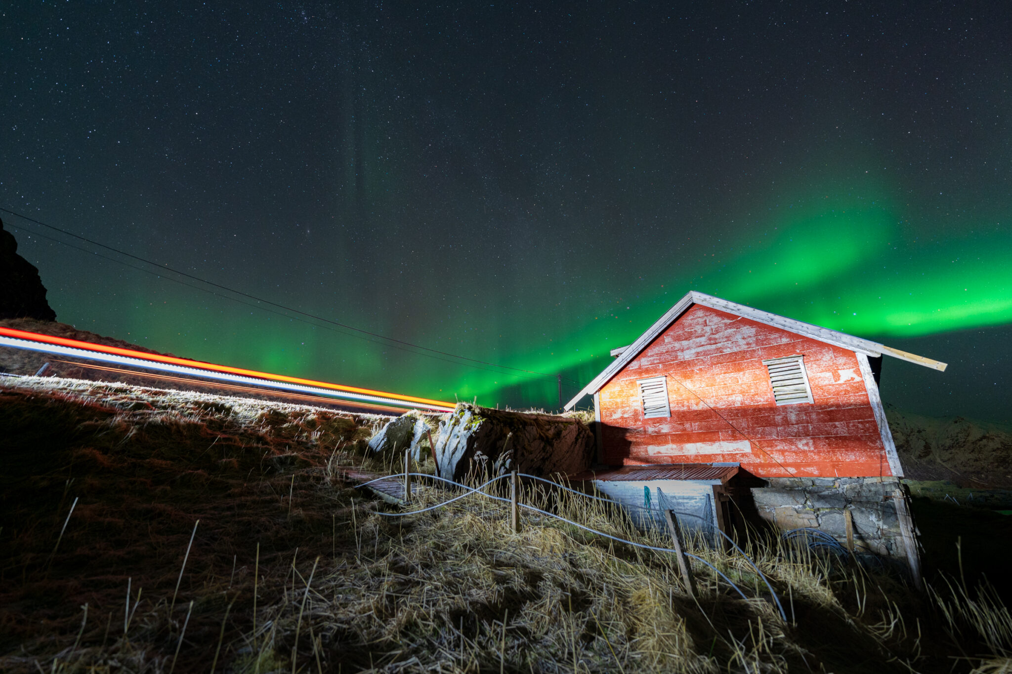 Long exposure light trails and aurora in Lofoten Norway